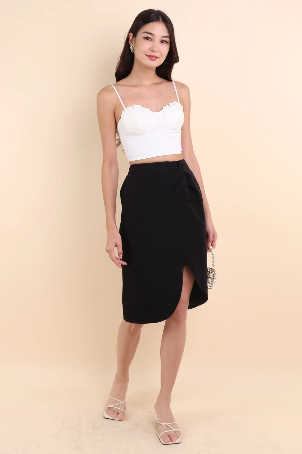 KINSLEY ASYMMETRICAL MIDI SKIRT IN BLACK